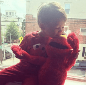 We dressed him up as Elmo and he loved seeing himself in the mirror.