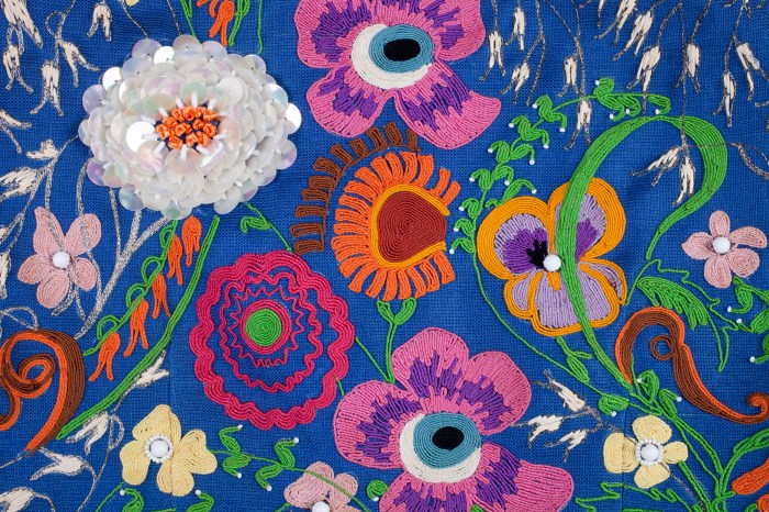 1998.4.24a Blue cropped top with beading and embroidery. Owned b